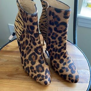 GUESS high heeled animal print boots in size 7